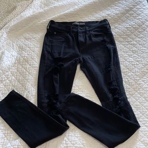 Express Jeans. Black “legging”mid rise. Distressed. Size 0.